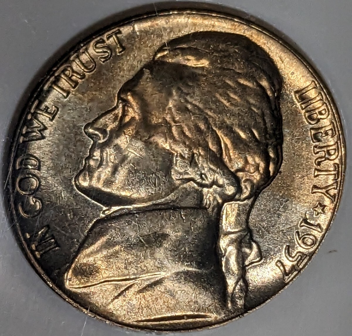 Side-by-side comparison of 1957 nickel Monticello reverse showing weak steps vs Full Steps designation